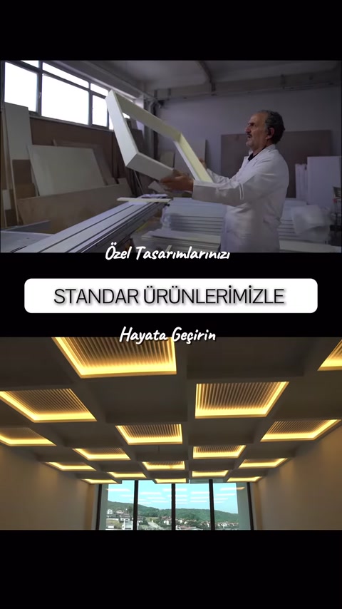 Uzun dekoratif armatür çerçevesi atölyede dikkatlice kaldırılıyor