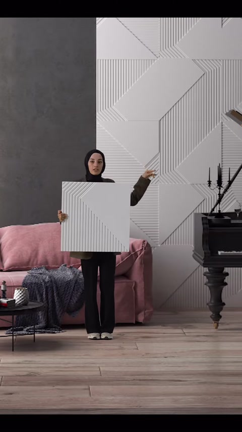 Panel örneği tutulurken duvardaki farklı geometrik dizilim gösteriliyor