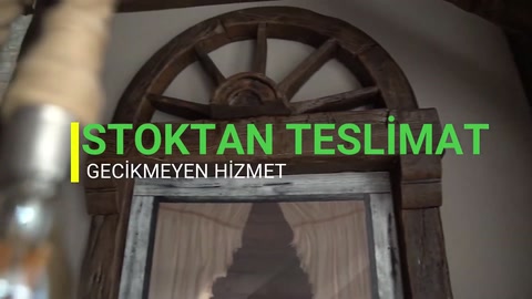 Kemerli rustik mekânda ahşap görünümlü kiriş uygulaması