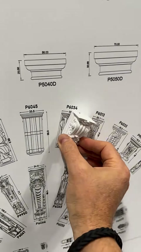 Kıvrımlı üst bölüme sahip payanda parçası çizimle eşleştiriliyor